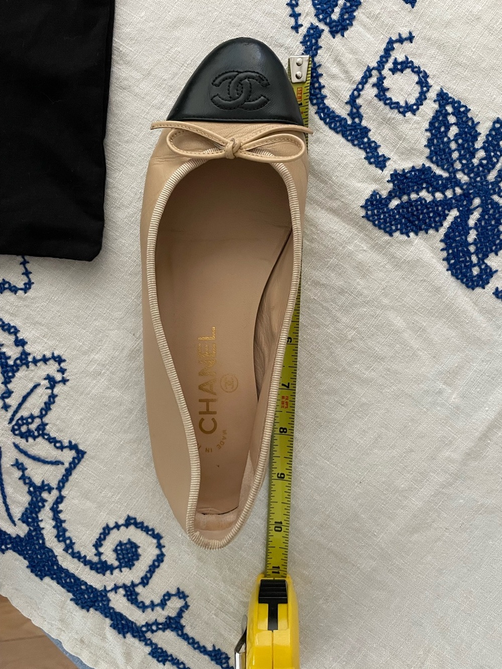CHANEL Beige Leather Ballet Flats with Black Cap Toe and Bow - Picture 9 of 10